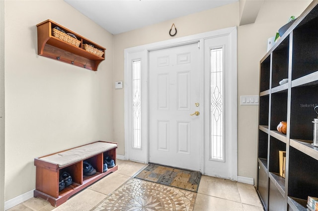 foyer entrance featuring light tile patterned floors