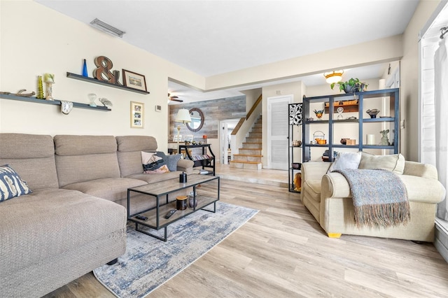 living room with light hardwood / wood-style floors