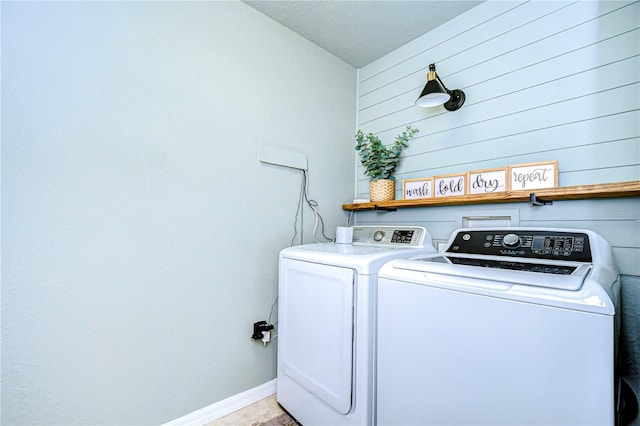 washroom featuring washing machine and dryer