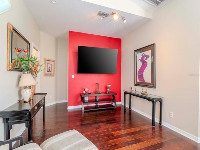 living room featuring dark hardwood / wood-style flooring