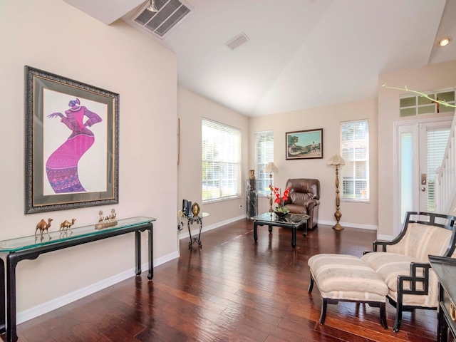 sitting room featuring lofted ceiling and dark hardwood / wood-style floors