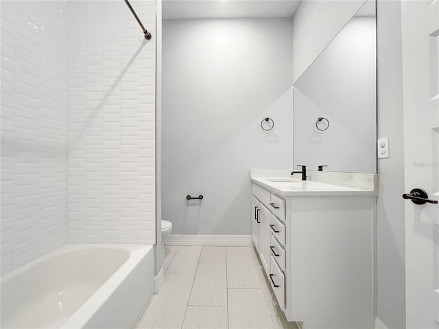 full bathroom with tile patterned floors, toilet, vanity, and  shower combination