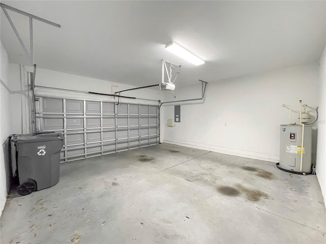 garage with a garage door opener and electric water heater