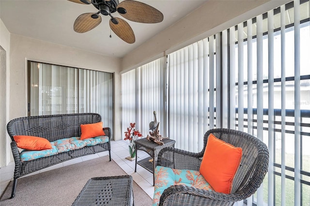 sunroom with ceiling fan and plenty of natural light