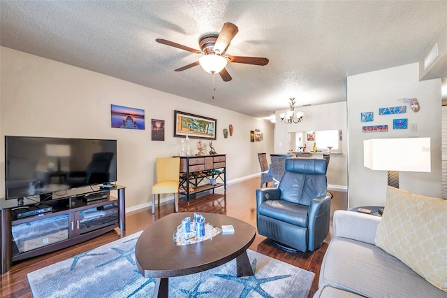 2700 Nebraska Ave Unit 3-201, Palm Harbor, FL 34684 - living room featuring a ceiling fan, a chandelier, wood finished floors, a textured ceiling, and baseboards