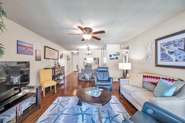 2700 Nebraska Ave Unit 3-201, Palm Harbor, FL 34684 - living area featuring a ceiling fan, wood finished floors, and a textured ceiling
