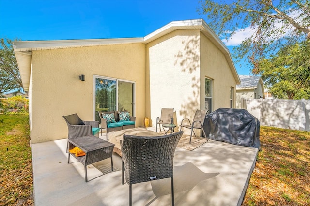 view of patio / terrace with an outdoor living space and area for grilling