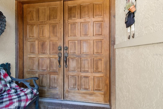 doorway to property featuring french doors