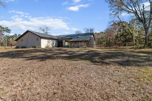 exterior space featuring a yard