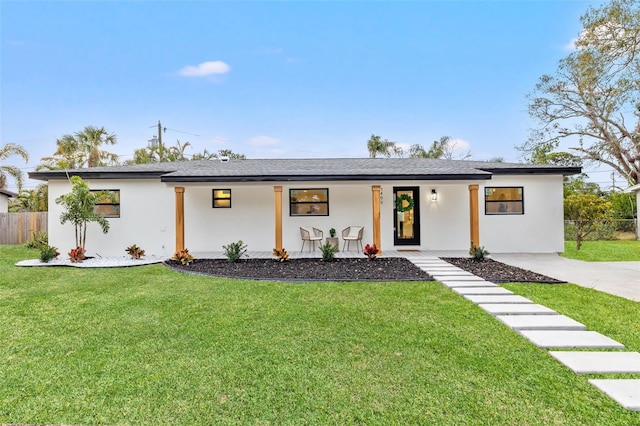 view of front of house featuring a front lawn and a porch