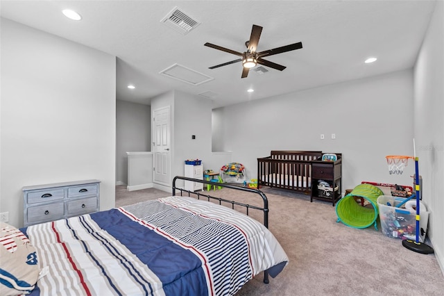 bedroom with ceiling fan and light colored carpet