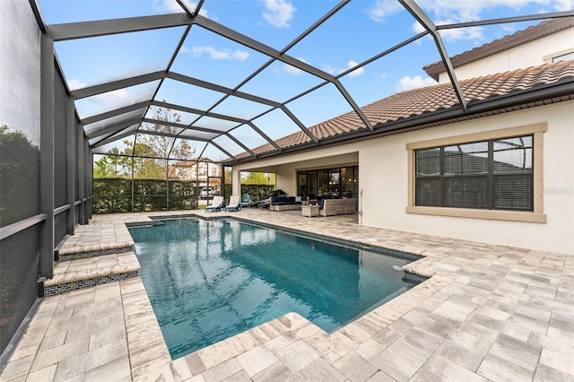 view of pool featuring a lanai, an outdoor living space, and a patio