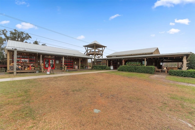 view of property's community featuring a yard