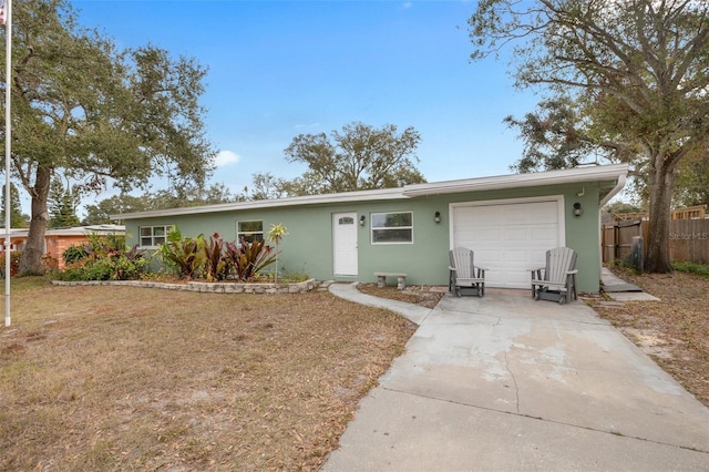 single story home featuring a garage