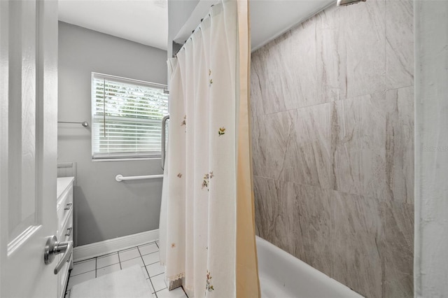 bathroom featuring vanity, tile patterned flooring, and shower / tub combo with curtain