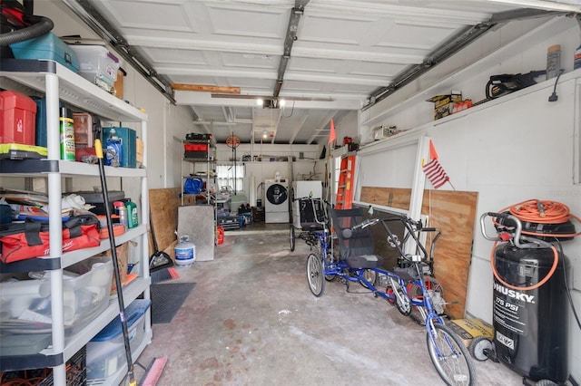 garage featuring washer and dryer