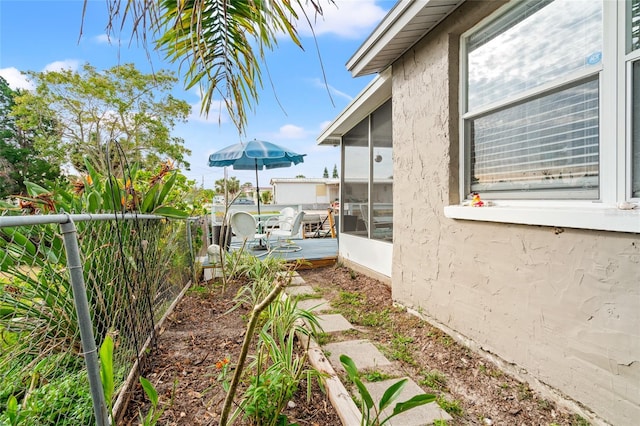 view of yard featuring a sunroom