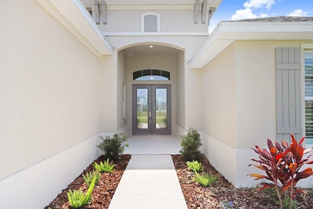 doorway to property with french doors