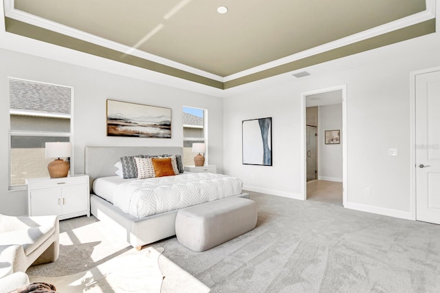 bedroom with a raised ceiling, ornamental molding, and light carpet