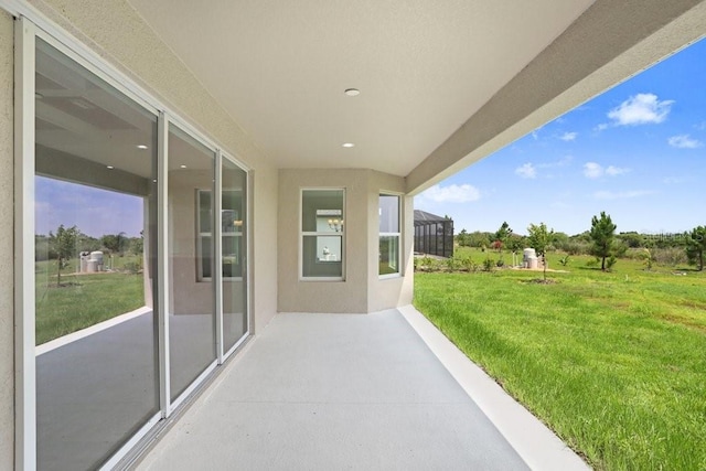 view of patio / terrace with glass enclosure