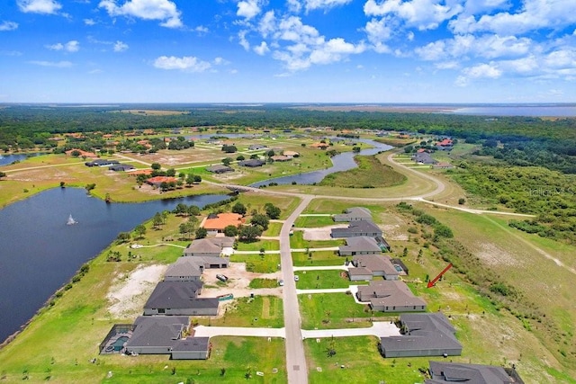 drone / aerial view featuring a water view