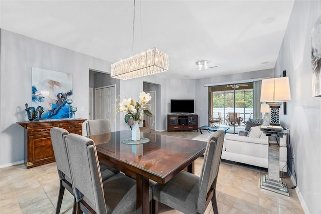 dining room with a chandelier