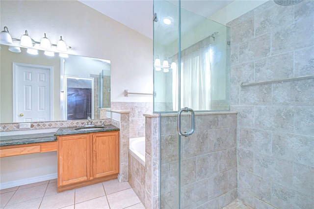 bathroom featuring tile patterned floors, independent shower and bath, and vanity