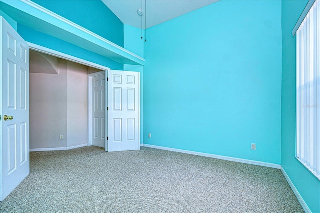 unfurnished bedroom with carpet