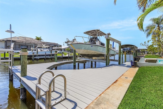 dock area featuring a water view and boat lift