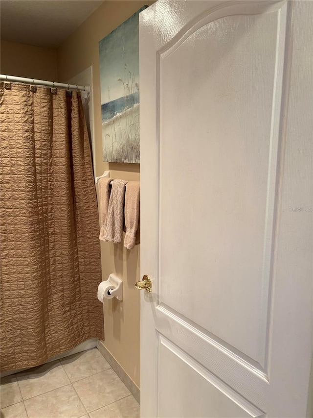 bathroom featuring tile patterned flooring