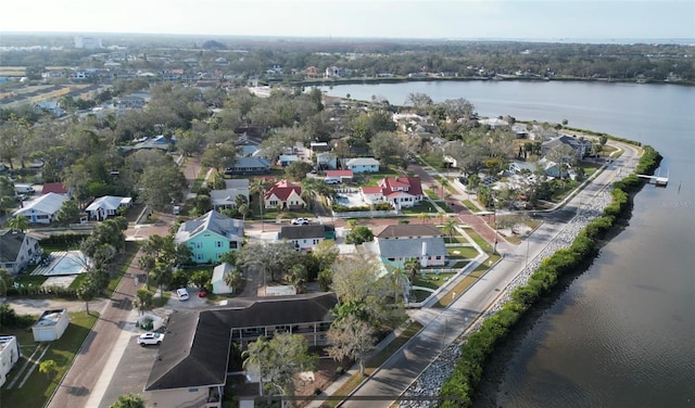 birds eye view of property featuring a water view and a residential view