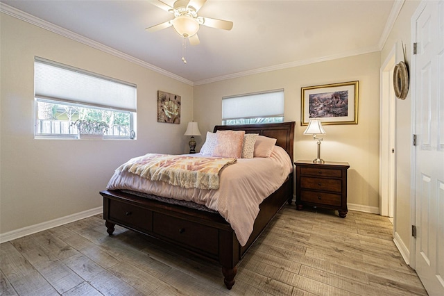 bedroom featuring ornamental molding, ceiling fan, and light hardwood / wood-style flooring