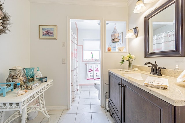 bathroom featuring ornamental molding, toilet, and vanity