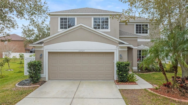 front facade with a garage and a front lawn