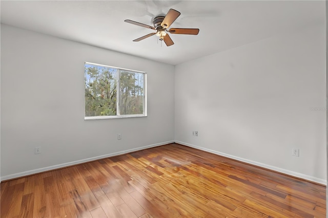 unfurnished room with ceiling fan and light hardwood / wood-style flooring