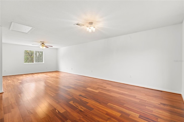 empty room with wood-type flooring