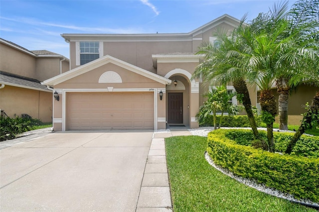 view of front of property with a garage