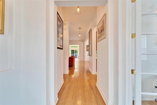 corridor featuring light hardwood / wood-style flooring