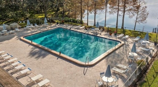 view of pool featuring a patio