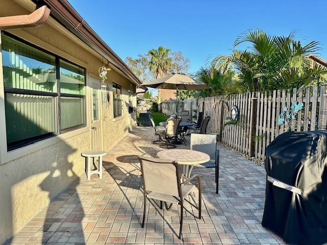 view of patio / terrace featuring a grill