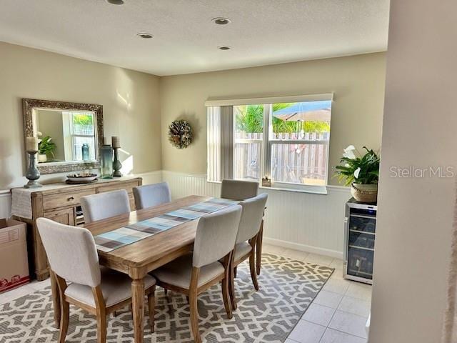 dining area featuring light tile patterned flooring