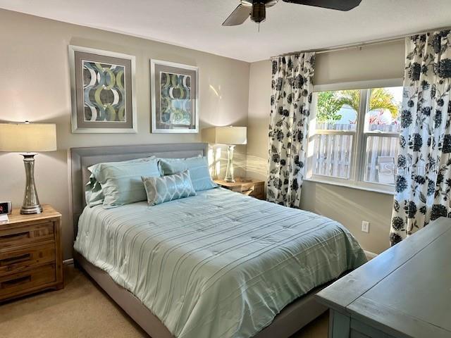 bedroom with carpet floors and ceiling fan