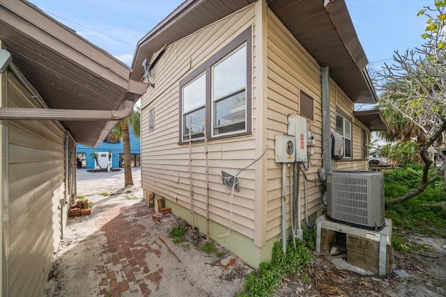 view of home's exterior featuring central AC unit