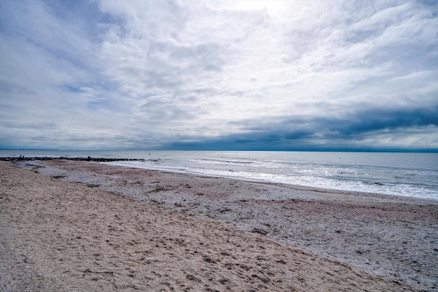 view of water feature with a beach view