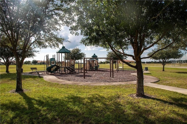 view of playground featuring a lawn