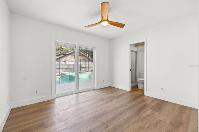 spare room with light hardwood / wood-style flooring and ceiling fan