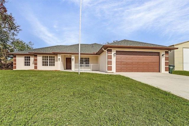 ranch-style house featuring a garage and a front yard