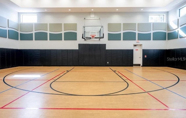 view of sport court with plenty of natural light