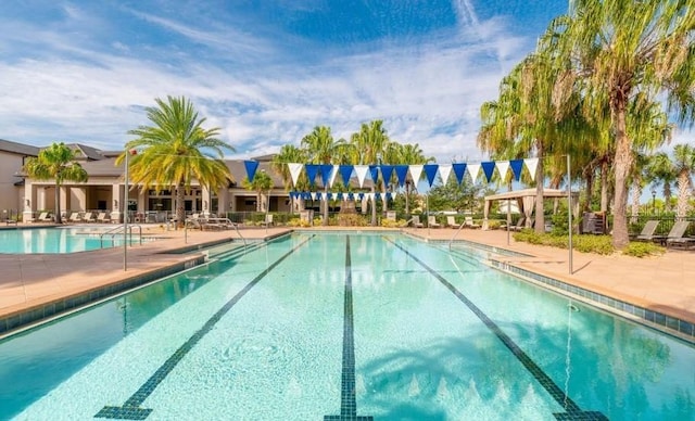 view of pool featuring a patio