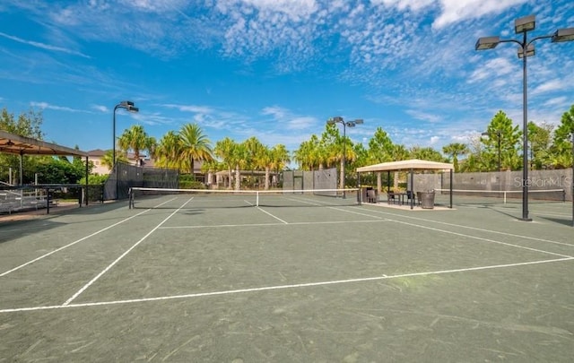 view of sport court with a gazebo